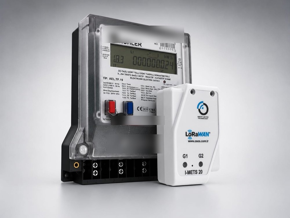 I-METS 20 module next to an existing Köhler electricity meter — real size comparison